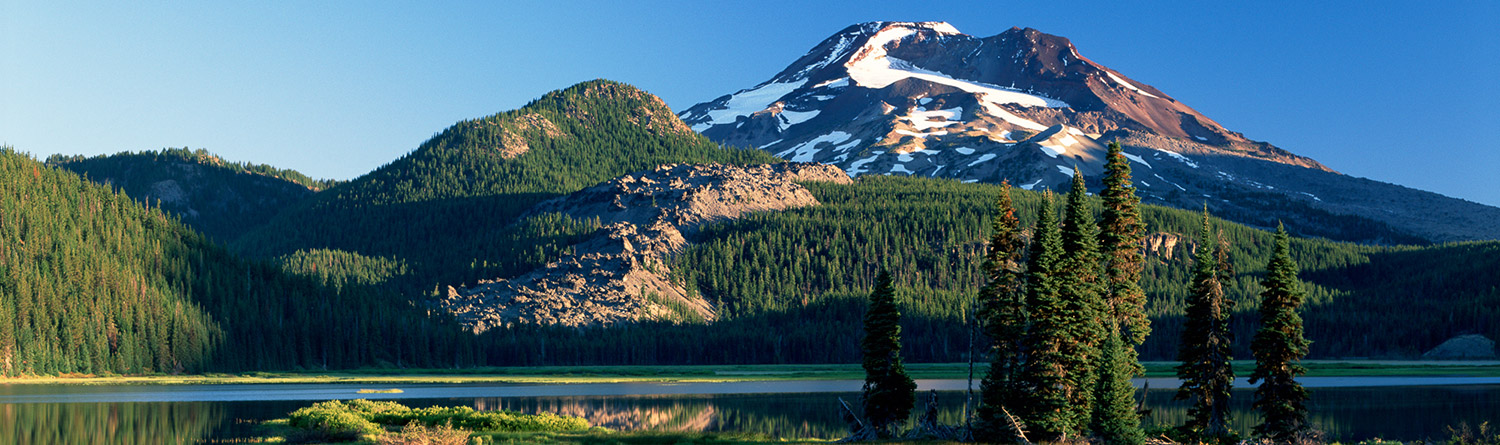 mountain scene with lake below it